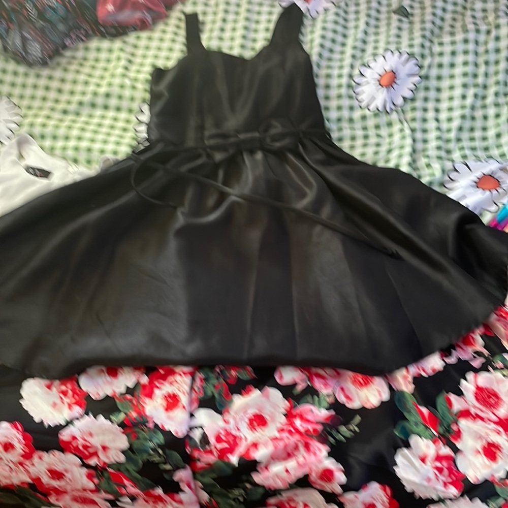 Black dress with a floral pattern